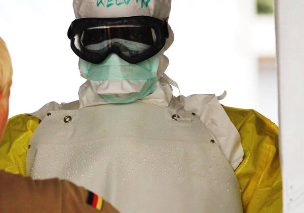 Liberian Ebola fighter, trained by the German armed forces at an Ebola Treatment Unit built by UN World Food Programme