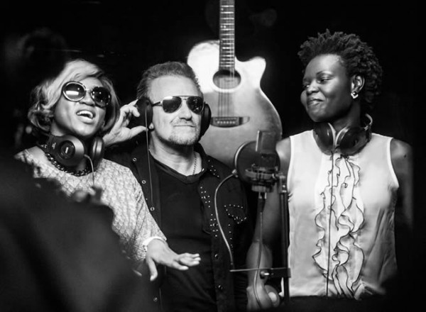 From left: Waje Iruobe, Bono, and Selmor Mtukudzi
