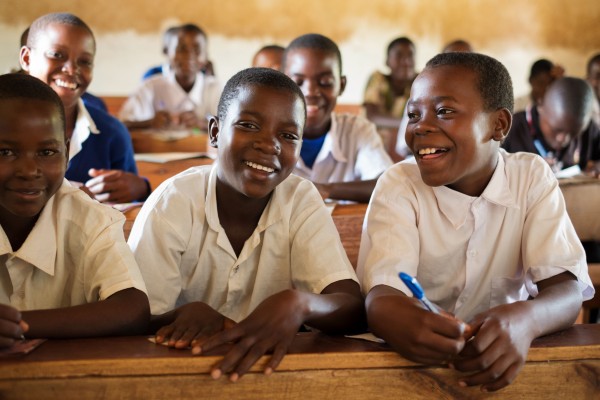 Eva, right, at Malinzanga Primary School with Ziada (left) and Jane (center). Photo by Daniel Hayduk