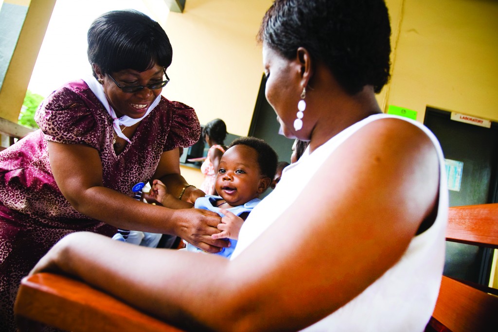 In Ghana, (from left) Veronica Gomez, a GHS breastfeeding program manager; 3-month-old Treasure Abbam; and mother Felicia Owodoo.
